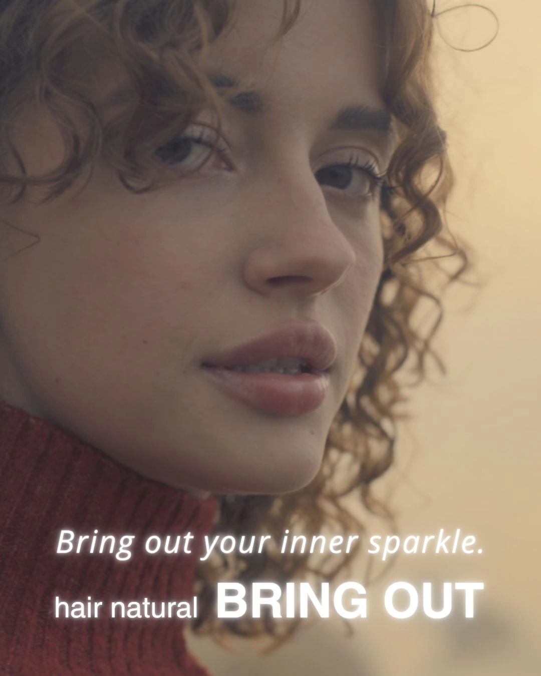 博多区の美容室BRING OUTのヒーロー画像。内面の輝きを放ち、強くしなやかに前を向く女性を表現しています。